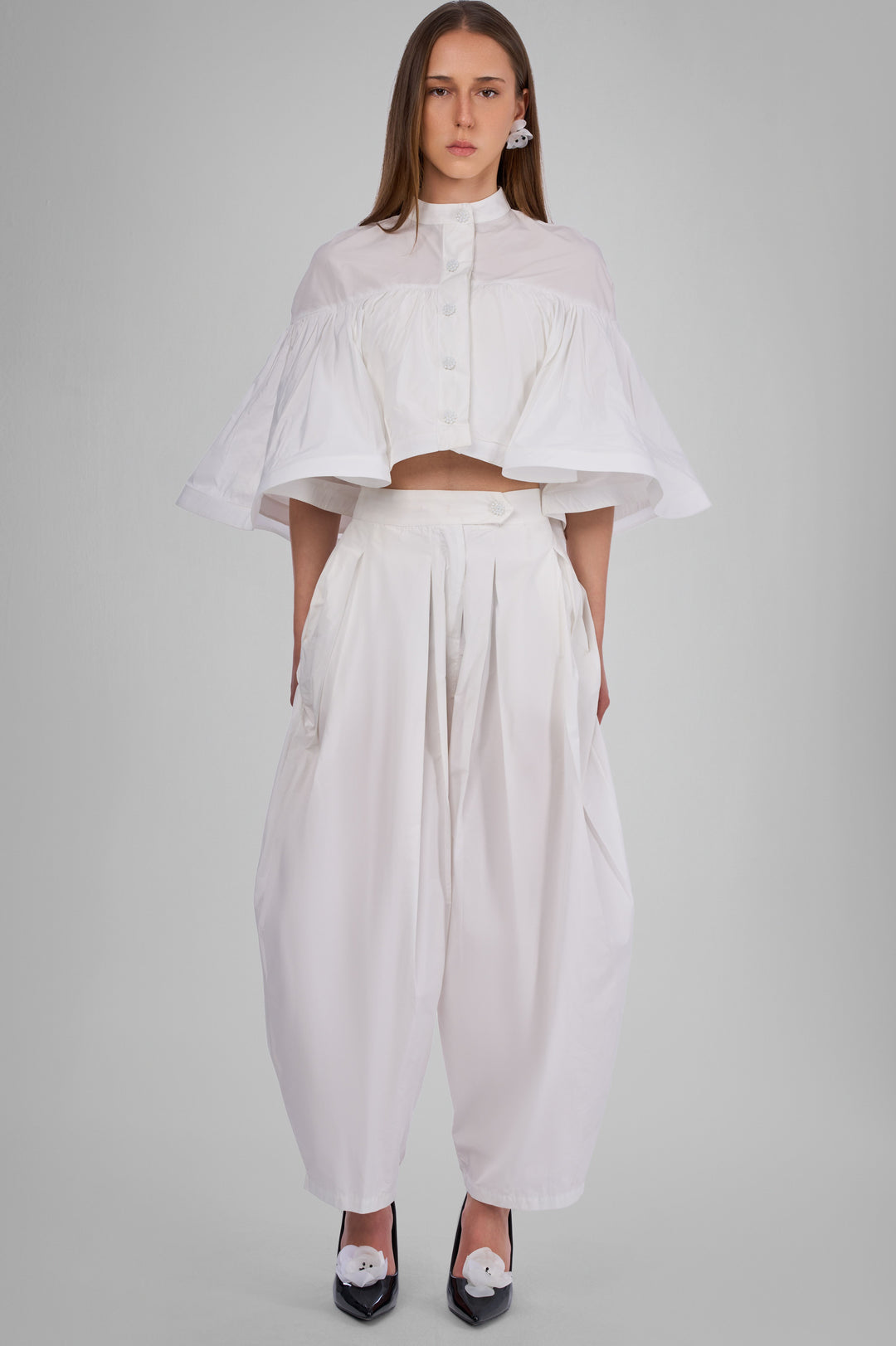 The Poise Sculpted Cape Top