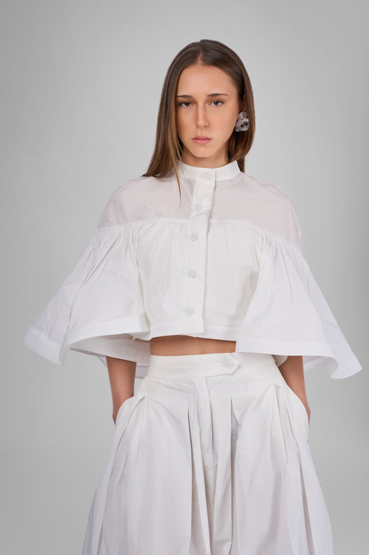 The Poise Sculpted Cape Top